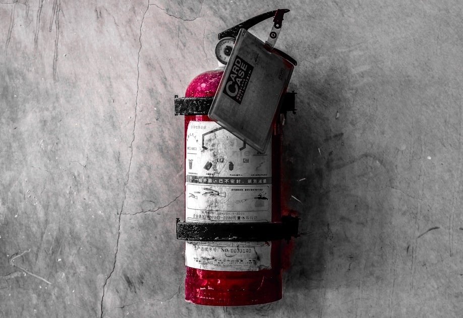 red and white fire extinguisher