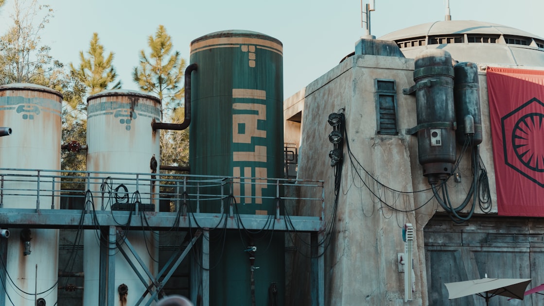a building with a lot of pipes on top of it