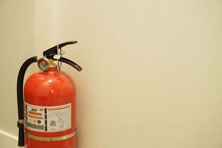 a fire extinguisher on a wall